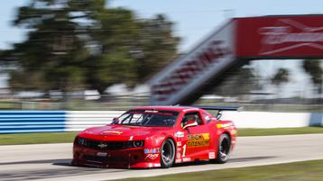 Champions lead first official practice of 2014